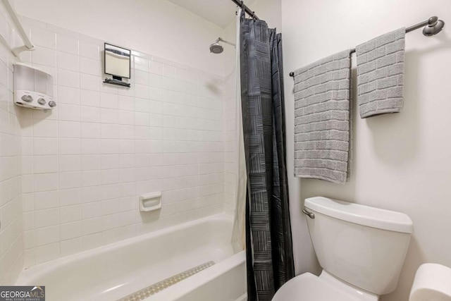 3203 Lenox Rd NE Unit 32, Atlanta, GA 30324 - bathroom with toilet and shower / bathtub combination with curtain