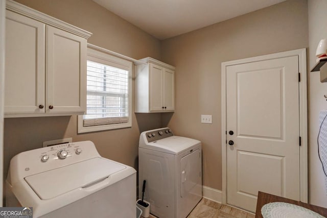 170 Elliot Cir, Watkinsville, GA 30677 - washroom with washer and dryer and cabinet space