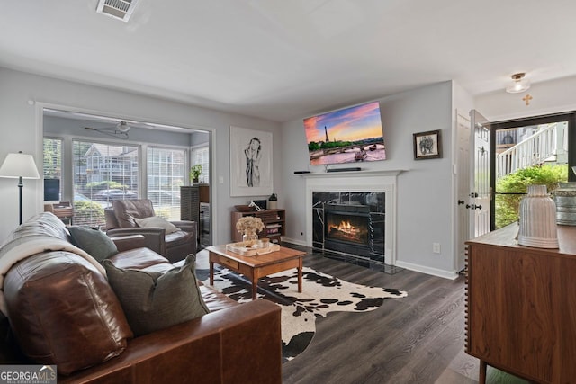 401 Berkeley Woods Dr, Duluth, GA 30096 - living area with dark wood finished floors and a fireplace