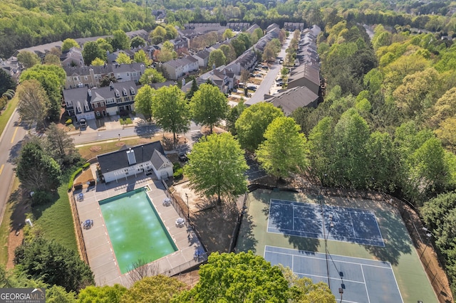 aerial view featuring a residential view and a view of trees
