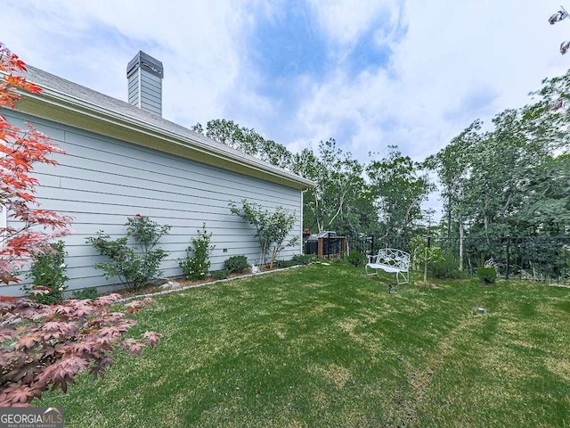 view of yard featuring fence