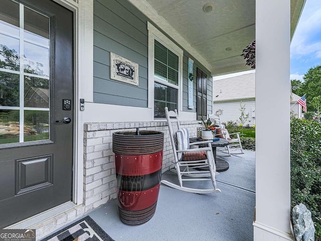 view of patio featuring a porch