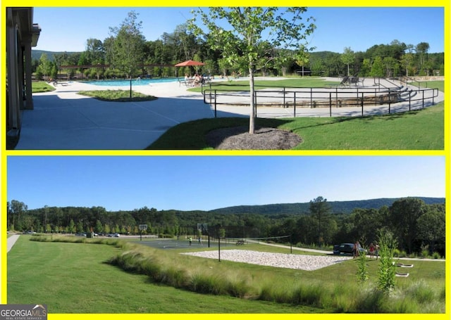 view of home's community with a wooded view, volleyball court, a pool, and a lawn