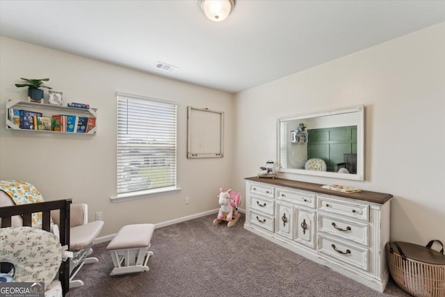 111 N Palmer St, Springfield, GA 31329 - bedroom with carpet flooring, visible vents, and baseboards