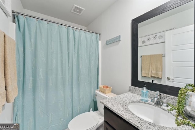 111 N Palmer St, Springfield, GA 31329 - full bath with vanity, visible vents, a shower with curtain, and toilet
