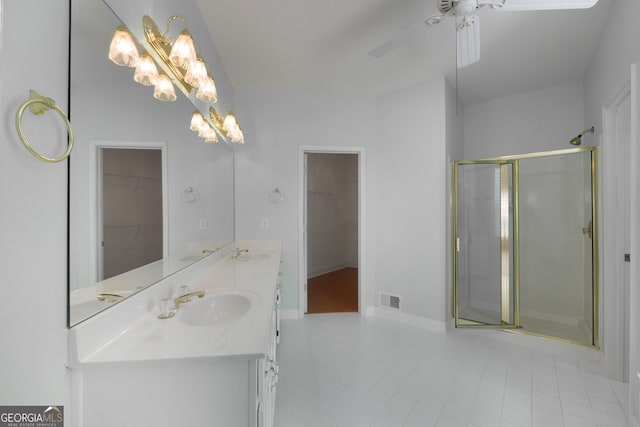 full bath featuring visible vents, a shower stall, tile patterned floors, and ceiling fan with notable chandelier