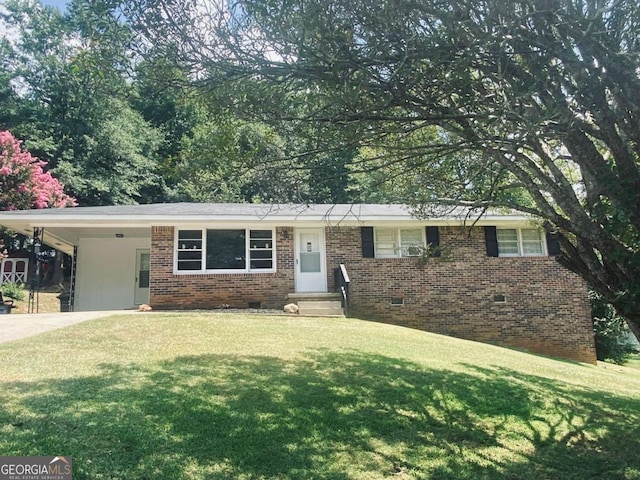 single story home with a carport, driveway, crawl space, a front lawn, and brick siding