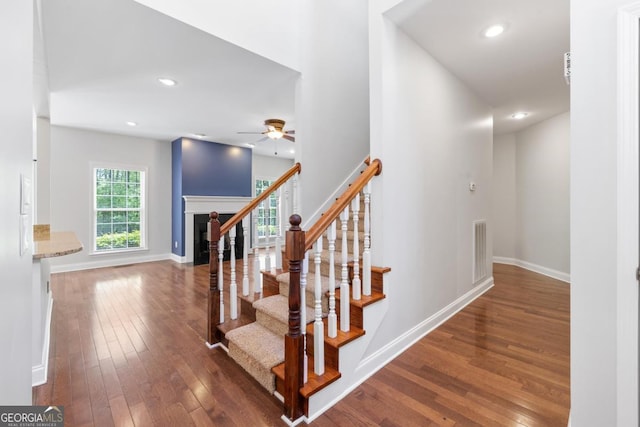 walk in closet with light carpet