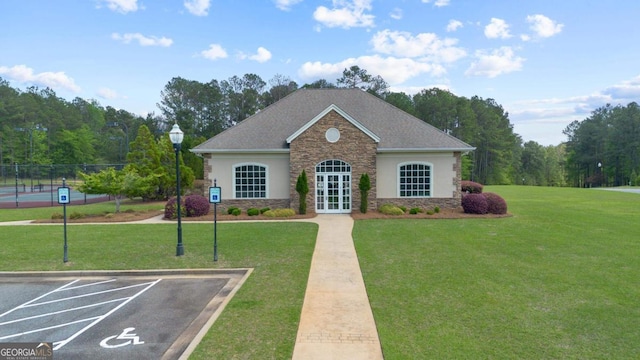 traditional-style home featuring concrete driveway, brick siding, and a garage