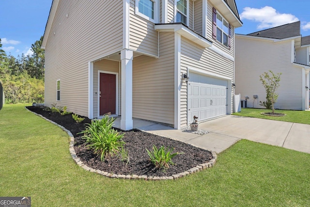 572 Brightleaf Cir, Hinesville, GA 31313 - view of home's exterior with a yard, driveway, and an attached garage