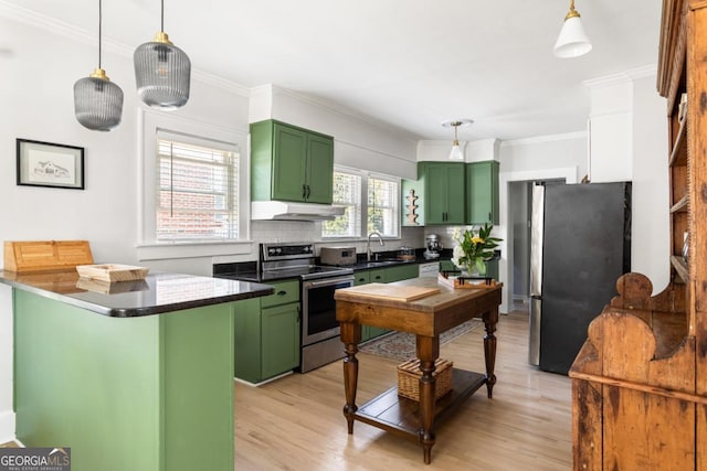 812 E Ponce De Leon Ave, Decatur, GA 30030 - kitchen featuring dark countertops, green cabinets, stainless steel appliances, and light wood-type flooring