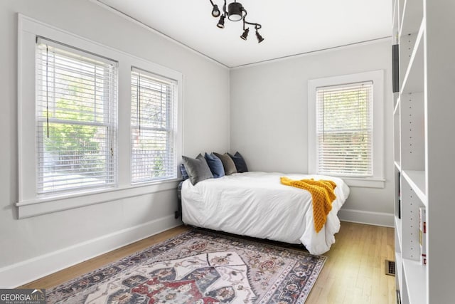 812 E Ponce De Leon Ave, Decatur, GA 30030 - bedroom with multiple windows and light wood-type flooring