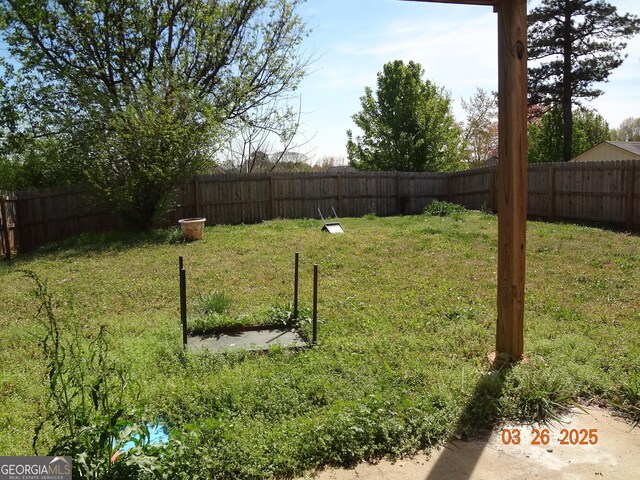 2338 Rambling Way, Lithonia, GA 30058 - view of yard featuring a fenced backyard