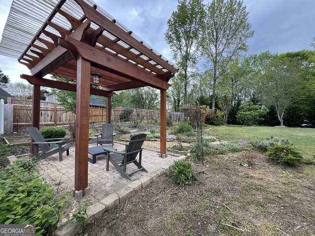 view of yard with a pergola, a patio, and fence