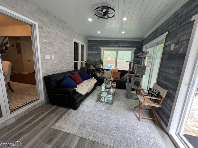 living room with stairway, recessed lighting, wooden ceiling, and wood finished floors