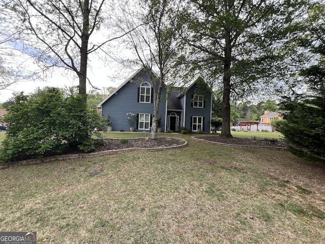 view of front facade featuring a front yard