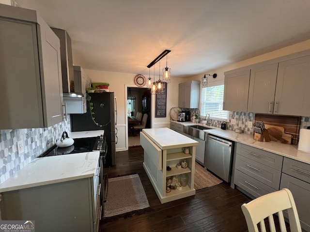 kitchen featuring gray cabinets, black gas stove, and stainless steel dishwasher