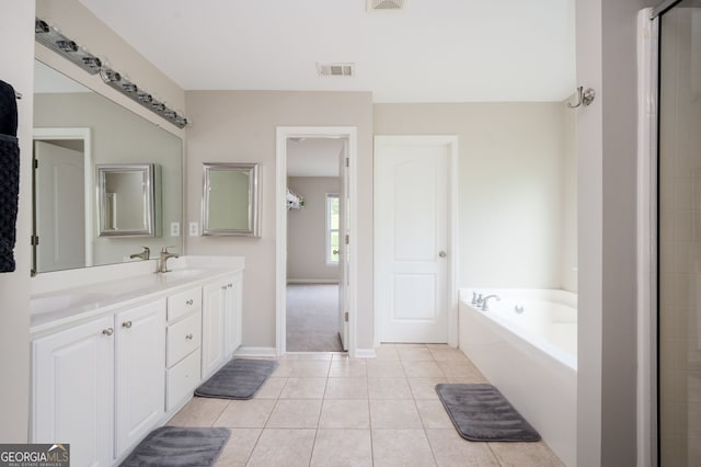 67 Ryans Pt, Dallas, GA 30132 - bathroom with a bath, vanity, tile patterned floors, and a shower with shower door
