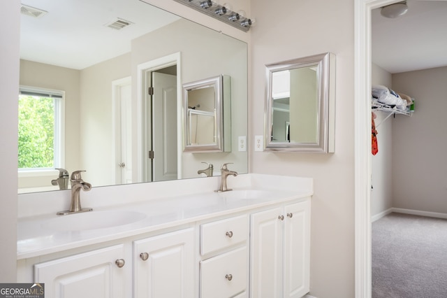 67 Ryans Pt, Dallas, GA 30132 - full bath with double vanity, visible vents, and a sink