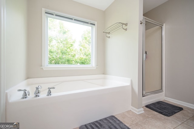 67 Ryans Pt, Dallas, GA 30132 - bathroom with a bath, a shower stall, and tile patterned floors