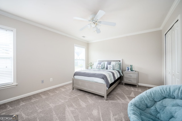 67 Ryans Pt, Dallas, GA 30132 - carpeted bedroom featuring crown molding, a closet, and ceiling fan