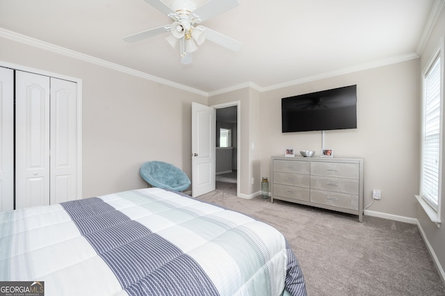 67 Ryans Pt, Dallas, GA 30132 - bedroom featuring carpet flooring, a closet, crown molding, and baseboards