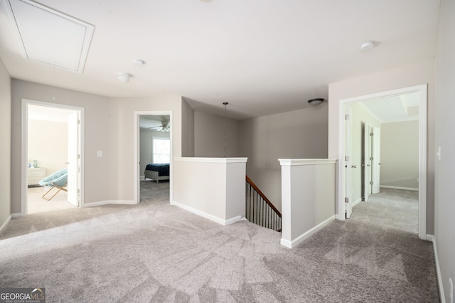 67 Ryans Pt, Dallas, GA 30132 - carpeted empty room featuring attic access and baseboards
