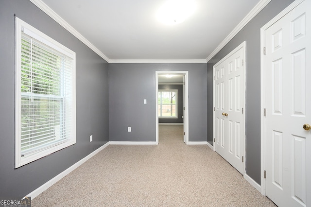 67 Ryans Pt, Dallas, GA 30132 - unfurnished bedroom with a closet, baseboards, ornamental molding, and carpet