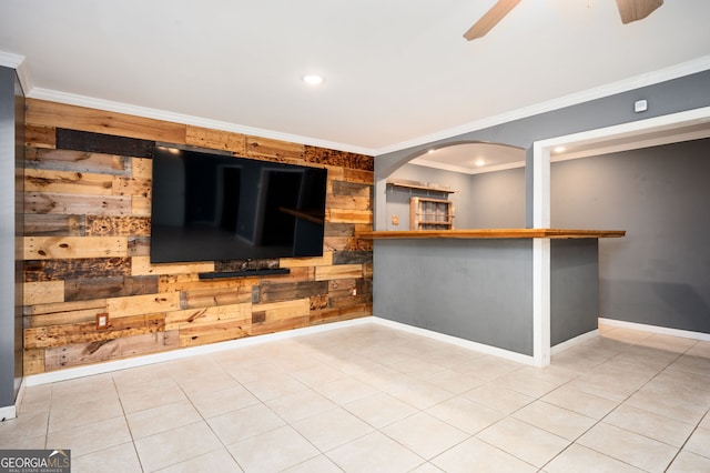 67 Ryans Pt, Dallas, GA 30132 - bar with a ceiling fan, baseboards, ornamental molding, and wooden walls