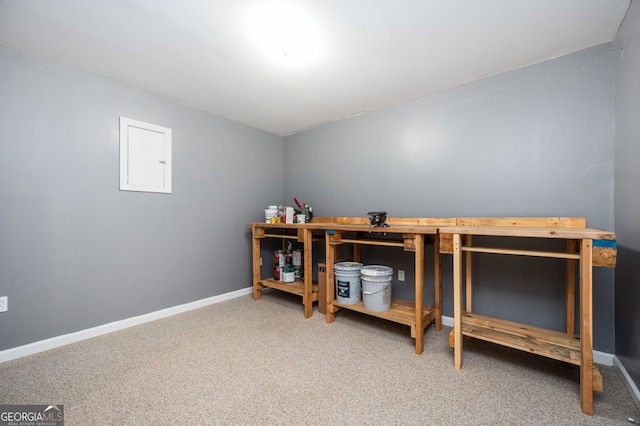 67 Ryans Pt, Dallas, GA 30132 - carpeted bedroom with baseboards and a workshop area