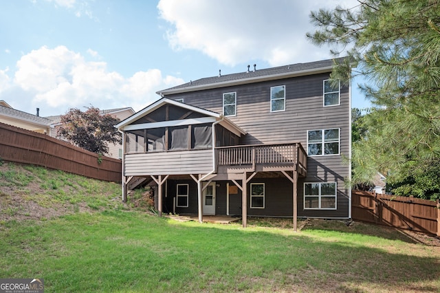 67 Ryans Pt, Dallas, GA 30132 - rear view of house featuring a fenced backyard, a sunroom, a yard, and a deck