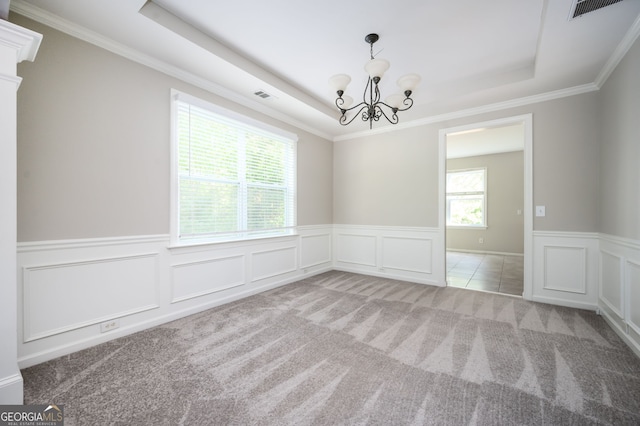 67 Ryans Pt, Dallas, GA 30132 - carpeted spare room with a wainscoted wall, visible vents, an inviting chandelier, and a raised ceiling