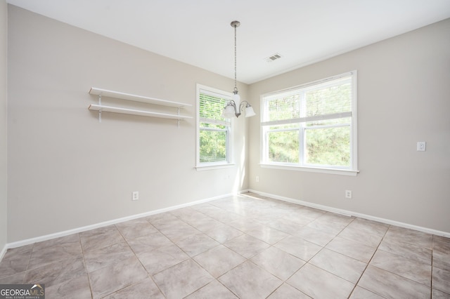 67 Ryans Pt, Dallas, GA 30132 - unfurnished dining area featuring a chandelier, visible vents, tile patterned floors, and baseboards