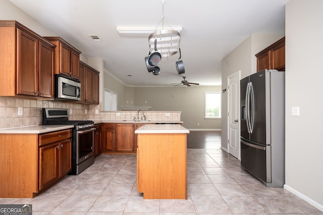 67 Ryans Pt, Dallas, GA 30132 - kitchen featuring visible vents, a ceiling fan, a sink, decorative backsplash, and appliances with stainless steel finishes