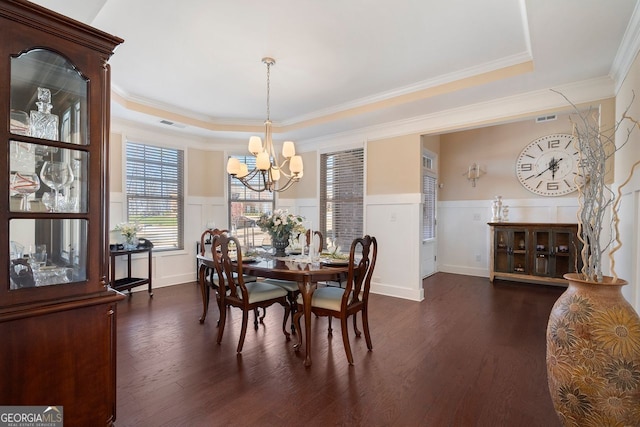 4538 Sterling Pointe Dr NW, Kennesaw, GA 30152 - dining space with a chandelier, dark wood-style floors, a decorative wall, crown molding, and a wainscoted wall