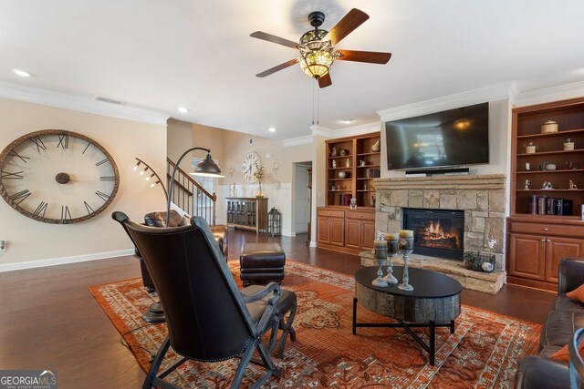4538 Sterling Pointe Dr NW, Kennesaw, GA 30152 - living room featuring ceiling fan, crown molding, a fireplace, baseboards, and dark wood-style floors