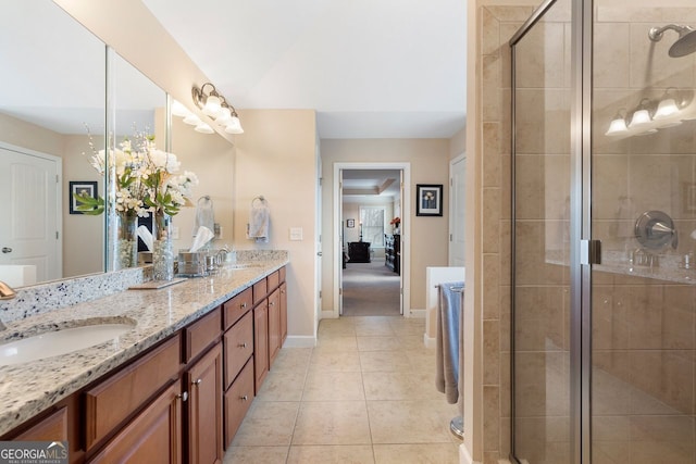 4538 Sterling Pointe Dr NW, Kennesaw, GA 30152 - full bath featuring a stall shower, double vanity, baseboards, and tile patterned floors