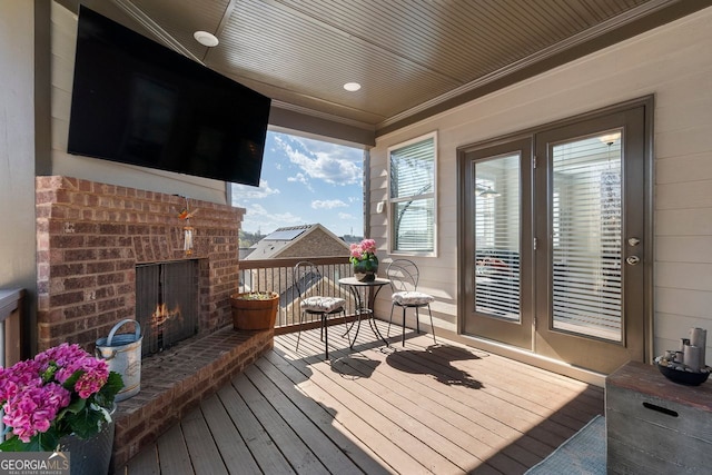 4538 Sterling Pointe Dr NW, Kennesaw, GA 30152 - deck with an outdoor brick fireplace and french doors