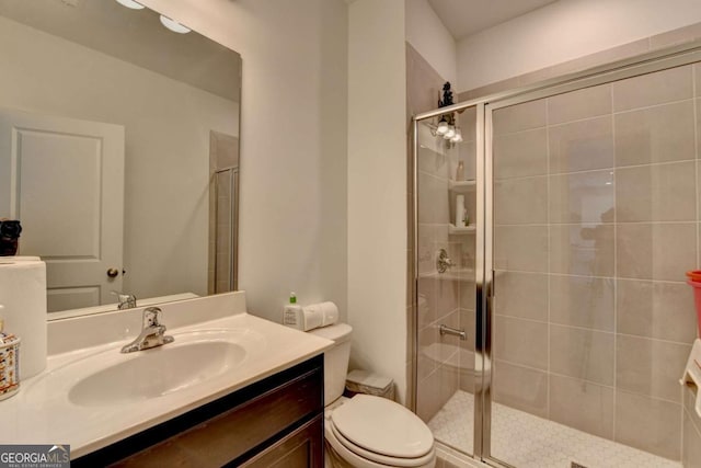 5530 Bower Pl, Cumming, GA 30028 - bathroom featuring toilet, a shower stall, and vanity