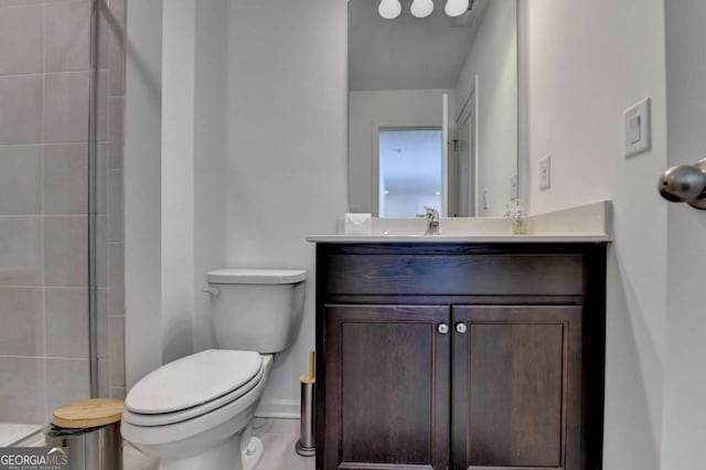 5530 Bower Pl, Cumming, GA 30028 - full bath featuring a tile shower, toilet, vanity, and baseboards