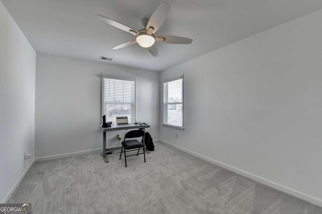 5530 Bower Pl, Cumming, GA 30028 - home office featuring carpet flooring, visible vents, baseboards, and a ceiling fan