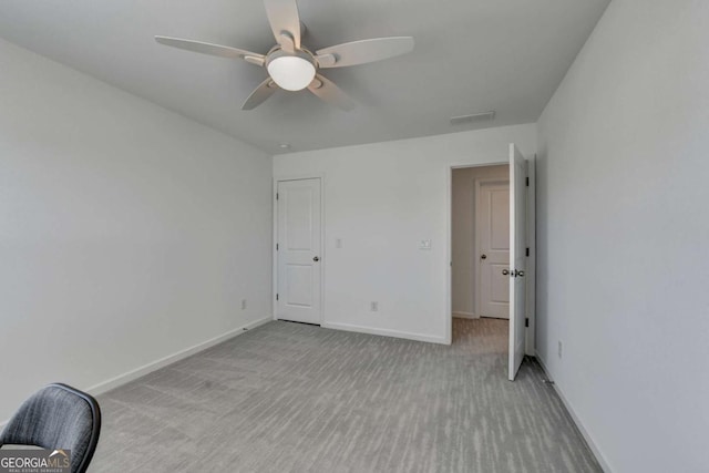 5530 Bower Pl, Cumming, GA 30028 - unfurnished bedroom with visible vents, baseboards, ceiling fan, and carpet