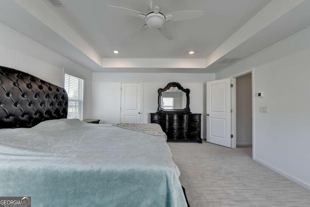 5530 Bower Pl, Cumming, GA 30028 - bedroom featuring ceiling fan, a tray ceiling, light colored carpet, recessed lighting, and baseboards