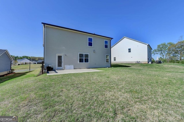 5530 Bower Pl, Cumming, GA 30028 - back of property featuring a patio and a yard