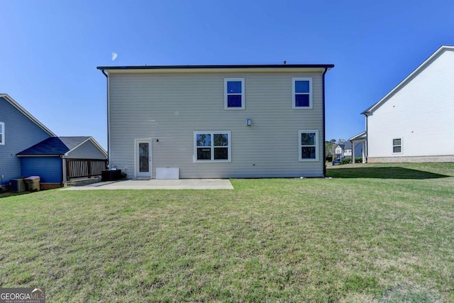 5530 Bower Pl, Cumming, GA 30028 - back of property with central air condition unit, a patio, and a lawn