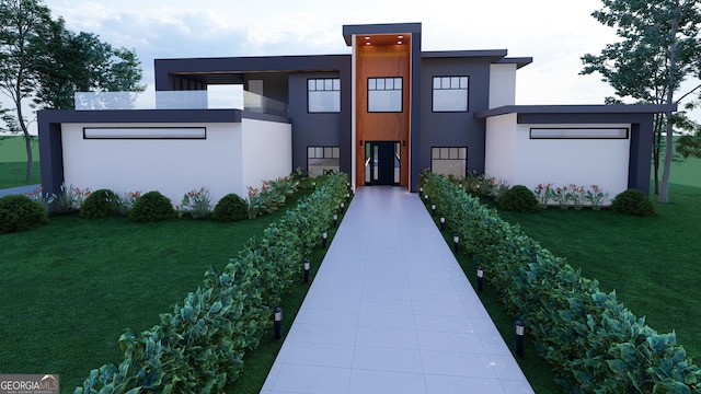 1068 Buckner Rd SE, Mableton, GA 30126 - modern home featuring a front yard and stucco siding