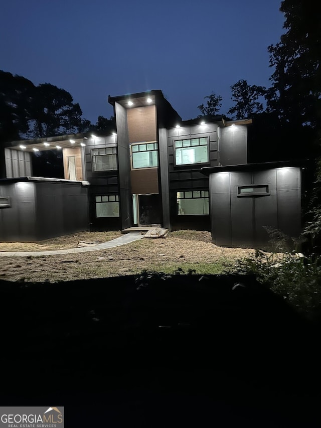 1068 Buckner Rd SE, Mableton, GA 30126 - view of back of house at night