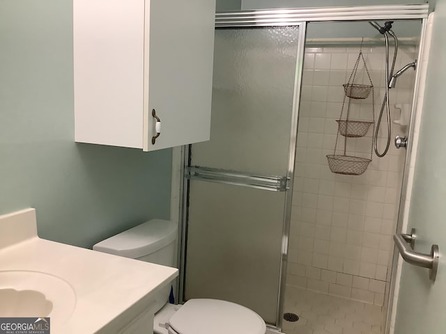 10 Horseshoe Bend Rd SW, Rome, GA 30165 - bathroom with a shower stall, vanity, and toilet