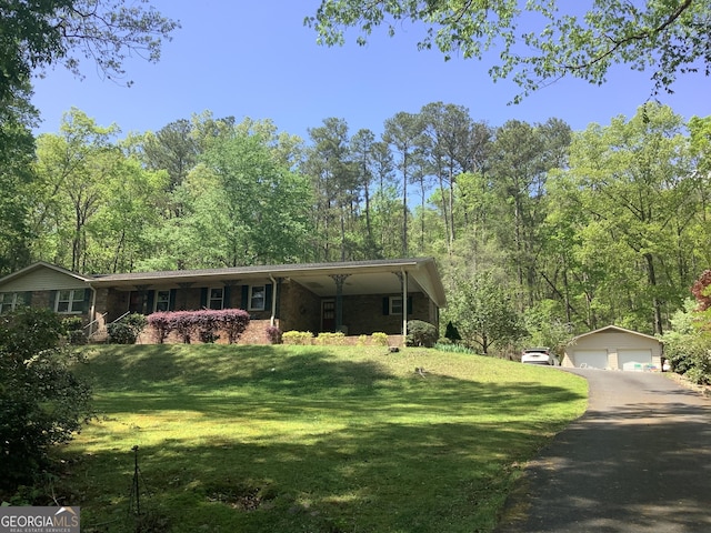 10 Horseshoe Bend Rd SW, Rome, GA 30165 - view of front of house featuring an outdoor structure, brick siding, a front yard, and a detached garage