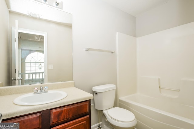 full bath featuring visible vents, toilet, bathtub / shower combination, and vanity